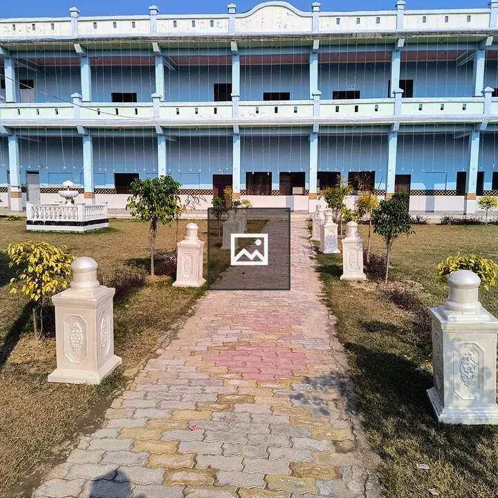 Paved Path with Pillars and Building
