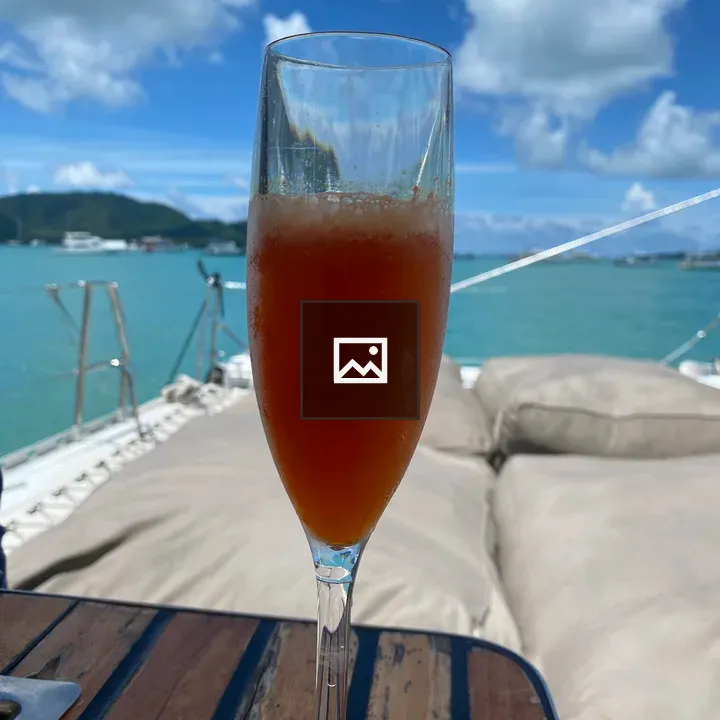 Tall red drink on boat