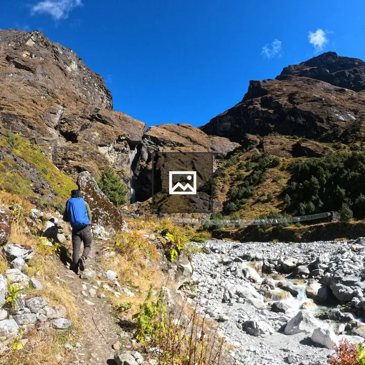Hiker on Rocky Mountain Trail