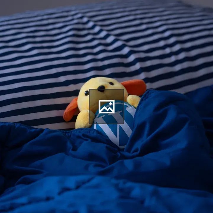 Wapuu Nap in Bed