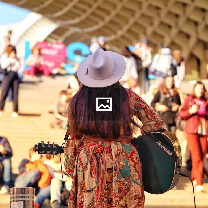 Street performer on stage with crowd