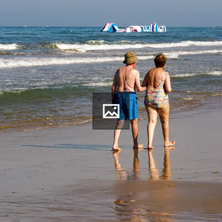 Elder couple on the beach