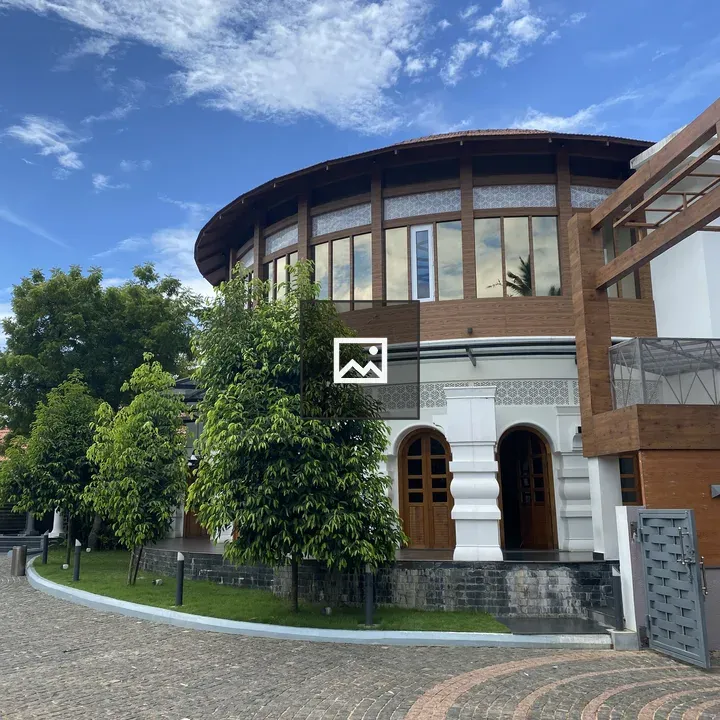 Modern building with curved wooden roof