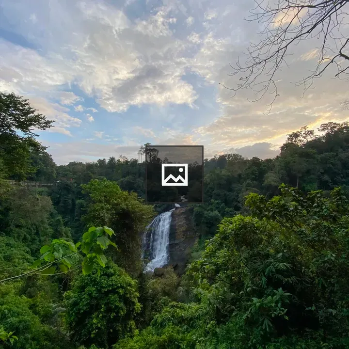Waterfall in Forest at Dusk