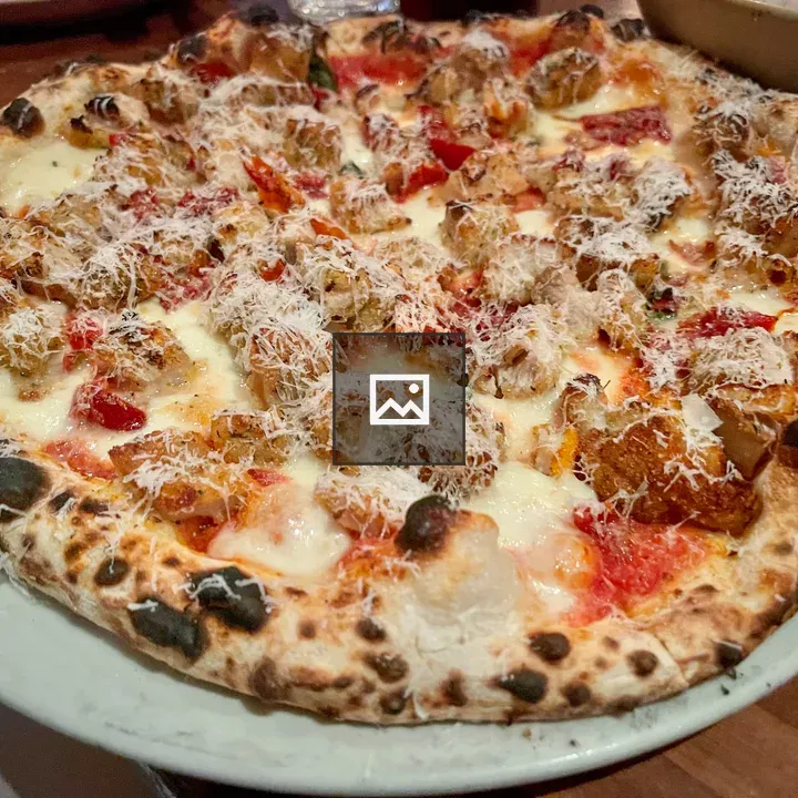 Wood fired pizza with meat