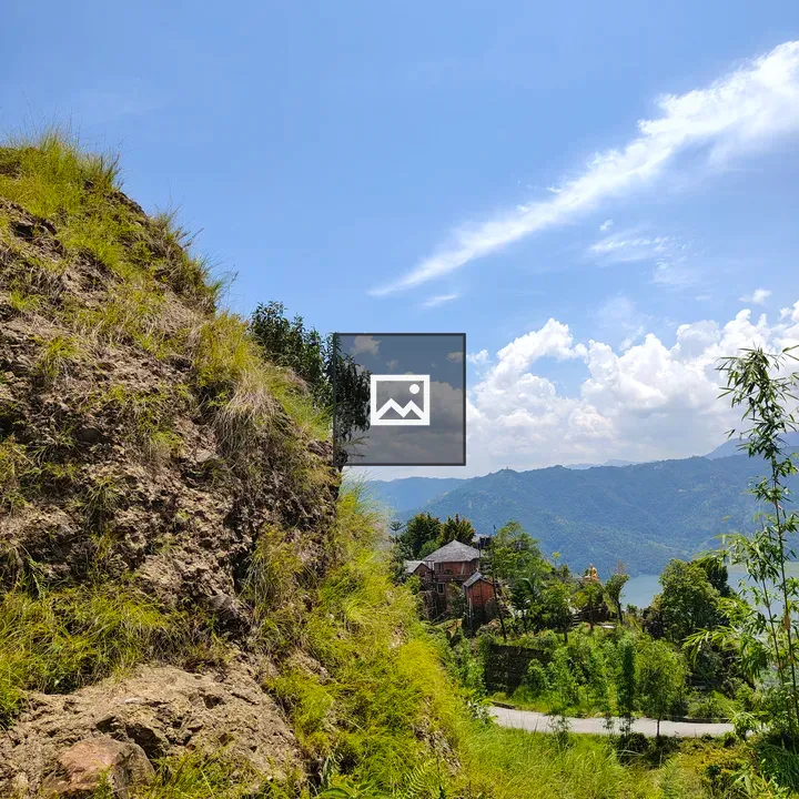 Hillside with Houses and Lake View