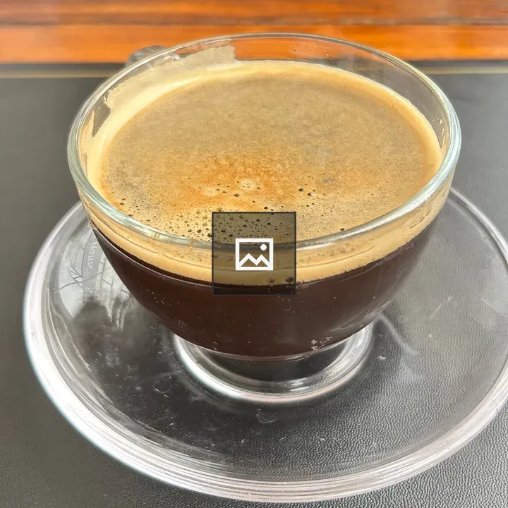 Glass Cup of Dark Coffee