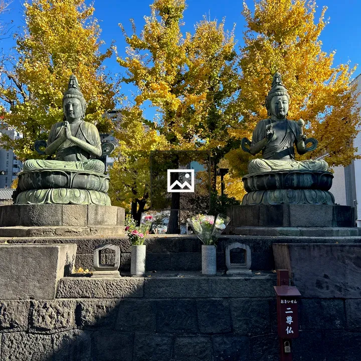 Bronze Buddhas on Stone Platform