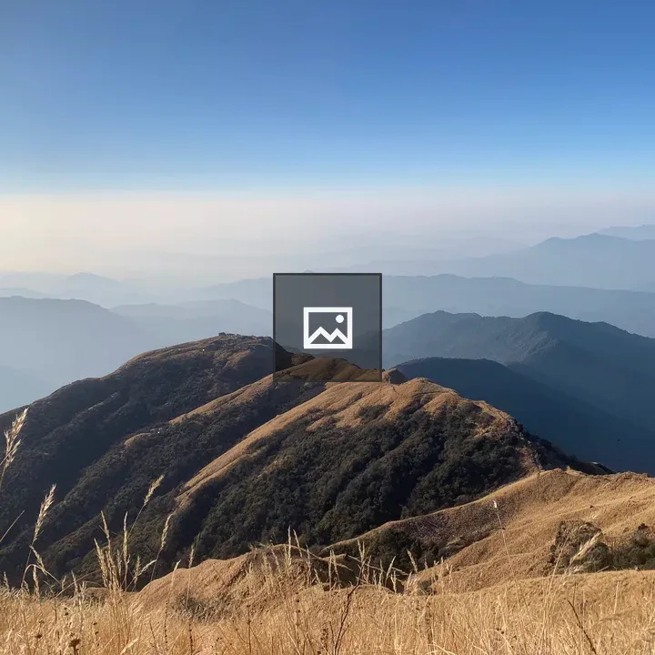Rolling Hills and Mountains Scene