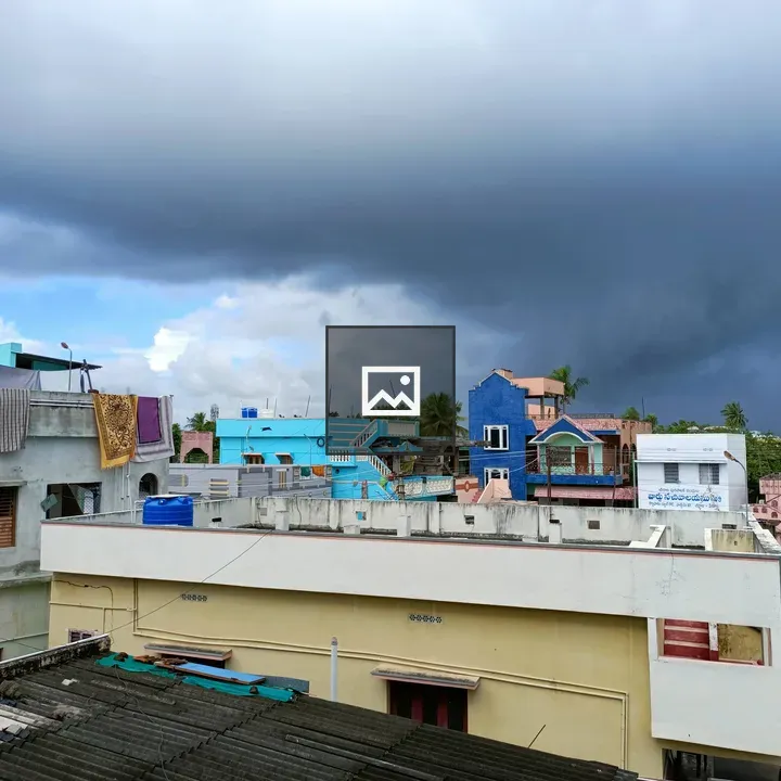 Stormy Sky Over Colorful Street
