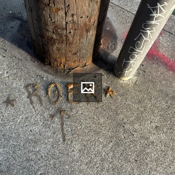 R O E K Letters on Sidewalk