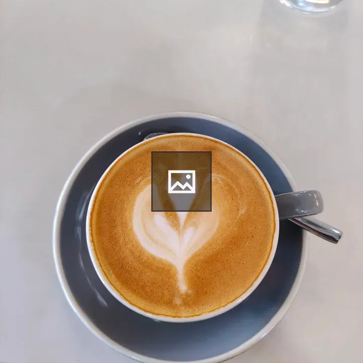 Cup of coffee with heart latte art