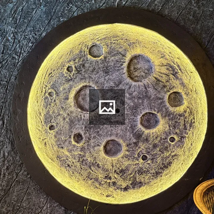 Moonlike circular wall decoration