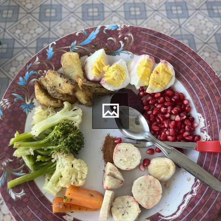 Plate with roasted potatoes and eggs