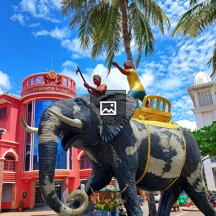 Elephant statue with coconut tree