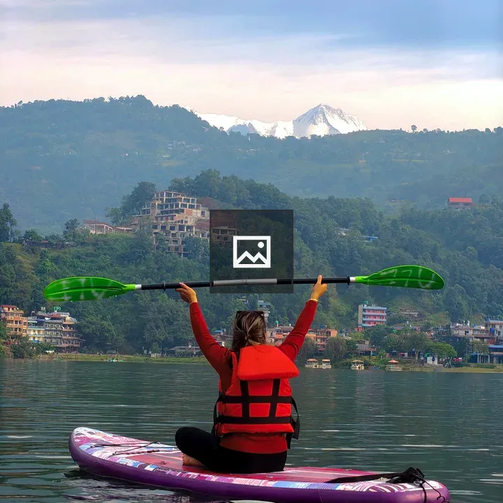 Person on purple stand-up paddleboard