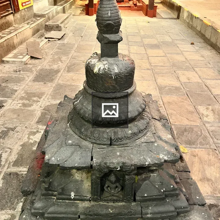 Stone stupa with carvings