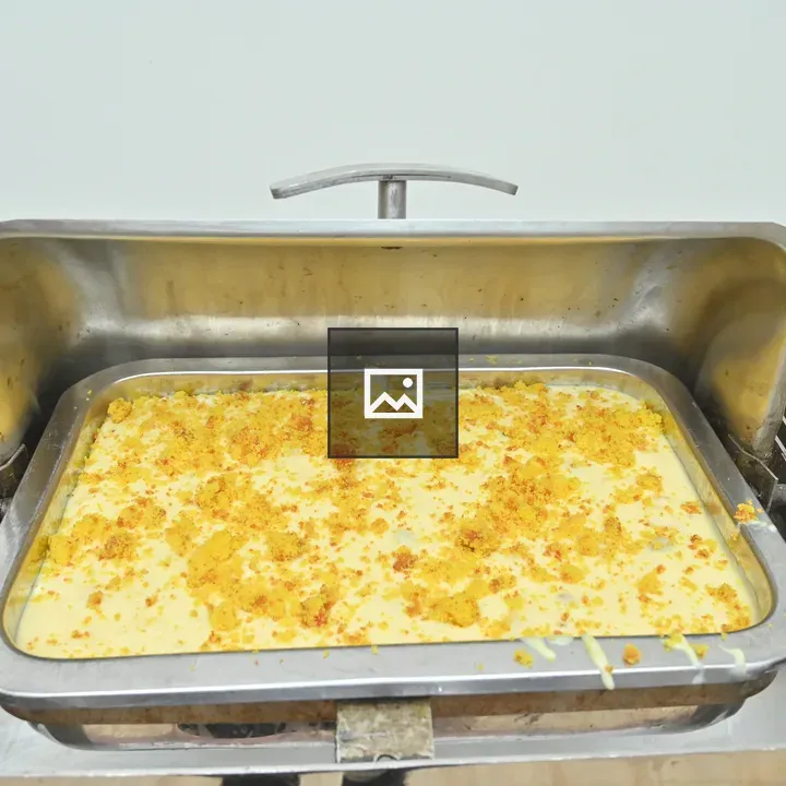 Stainless steel serving tray with creamy dish
