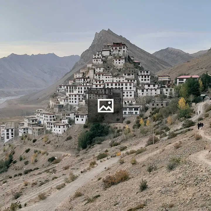 Hillside village with white buildings