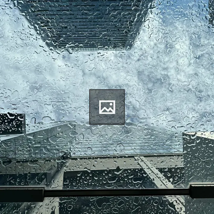 Glass-roofed rainy city scene