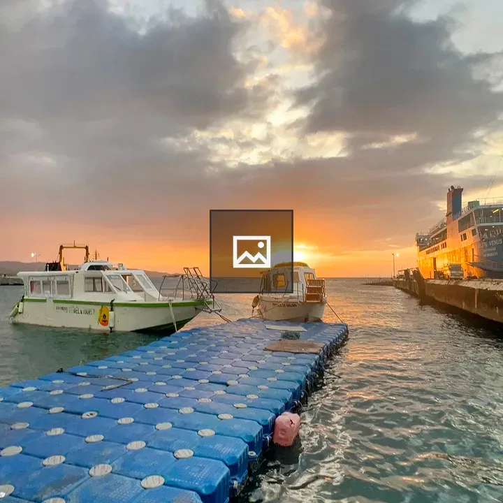 Boats Docked at Sunset Pier