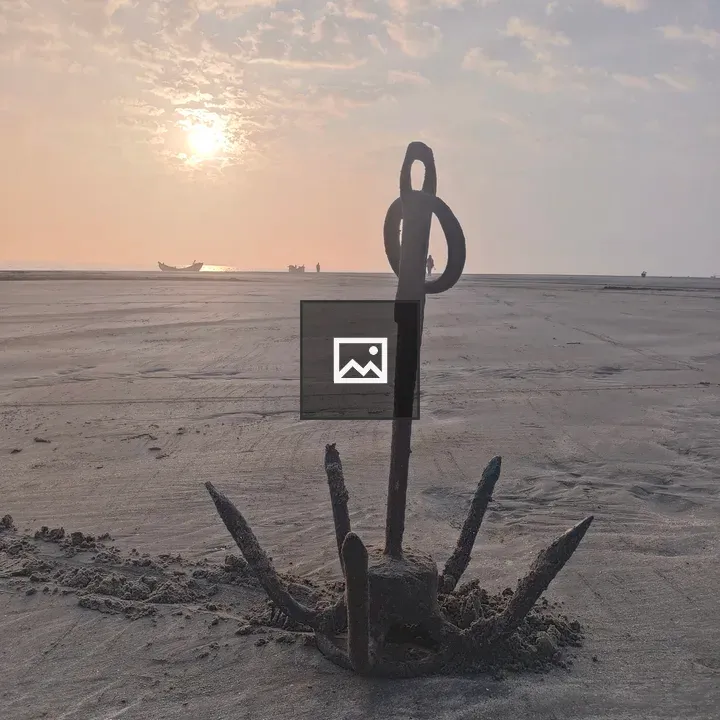 Old Anchor on Beach