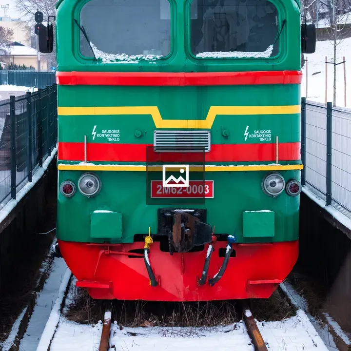 Colorful snow-covered train engine