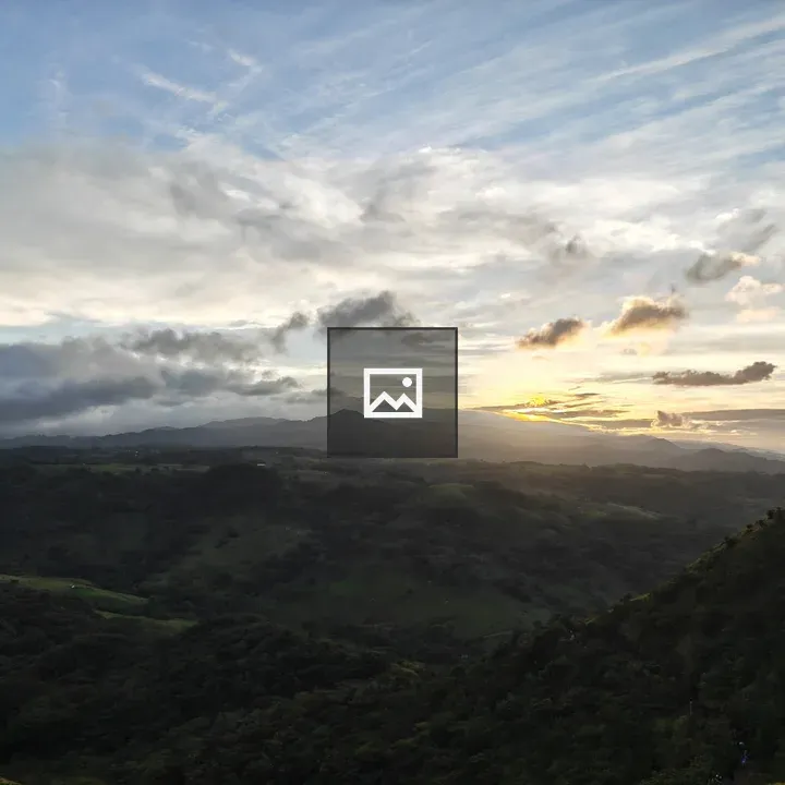 Sunset Over Green Hills