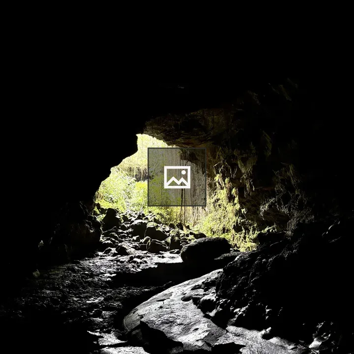 Cave Interior with Exit and Greenery