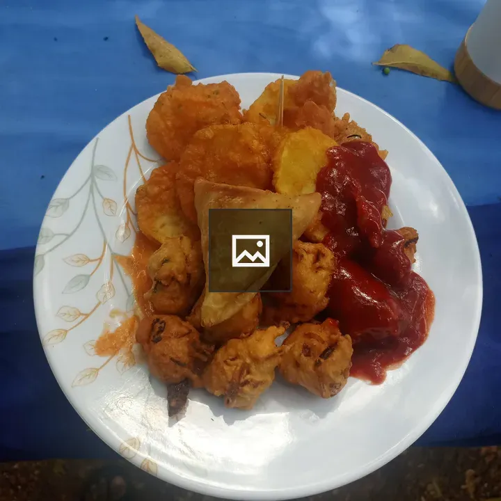 White leaf-patterned plate with snacks