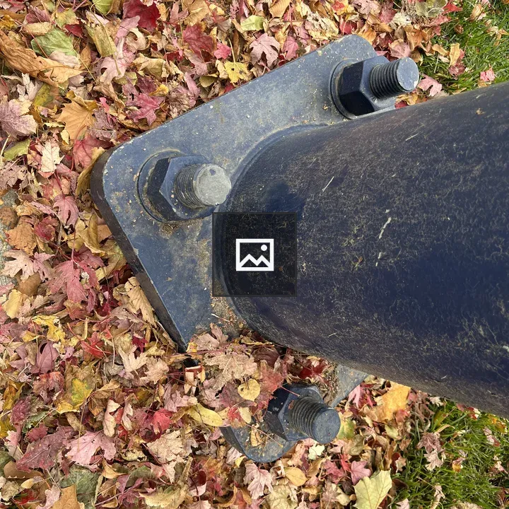 Giant nuts and bolts on street lamp