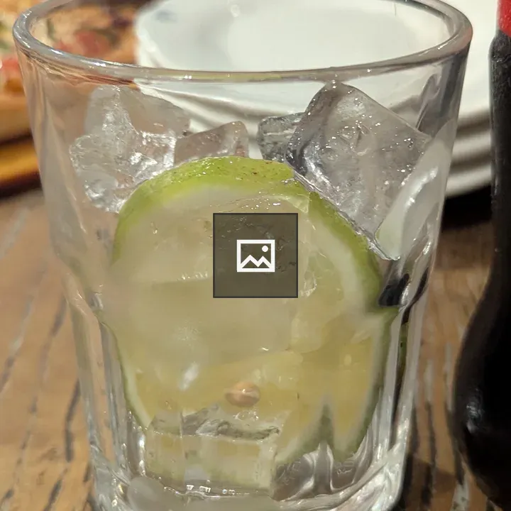 Empty glass with lemon slice