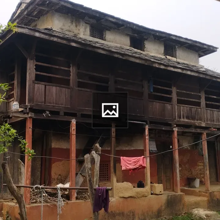 Old two-story house with balcony