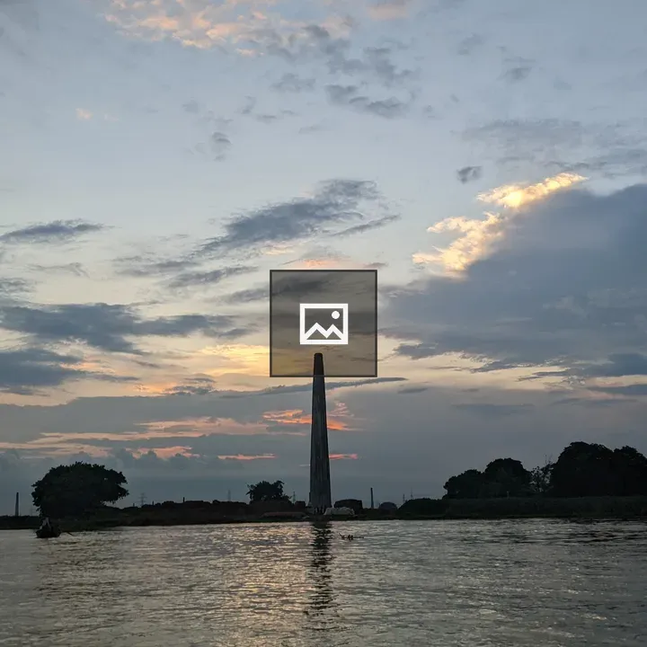 Tall chimney at sunset