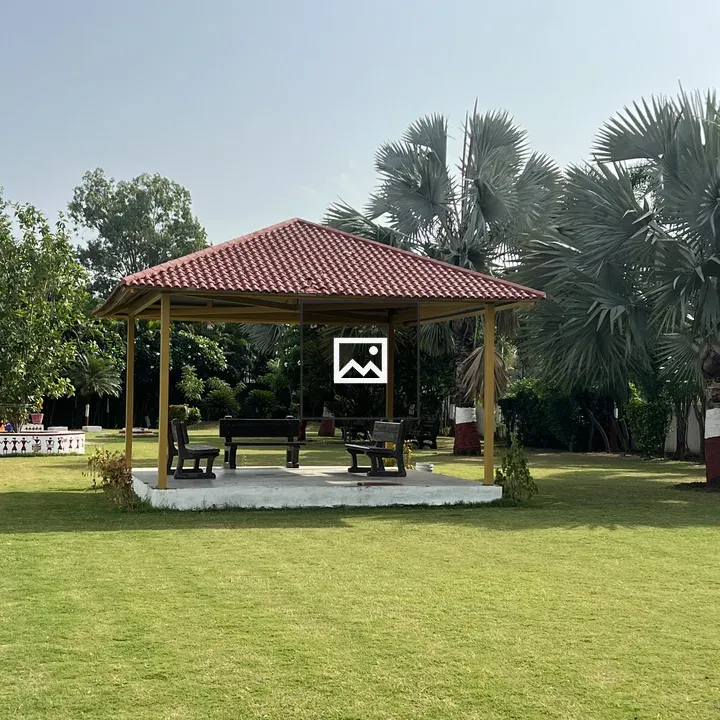 Red-roofed gazebo in garden