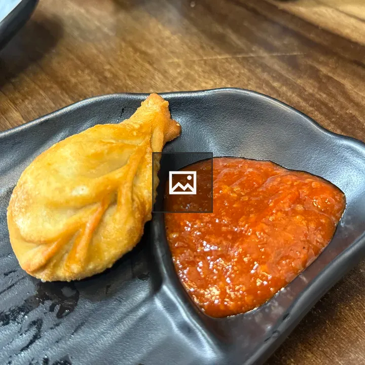 Indian dish with chilli sauce