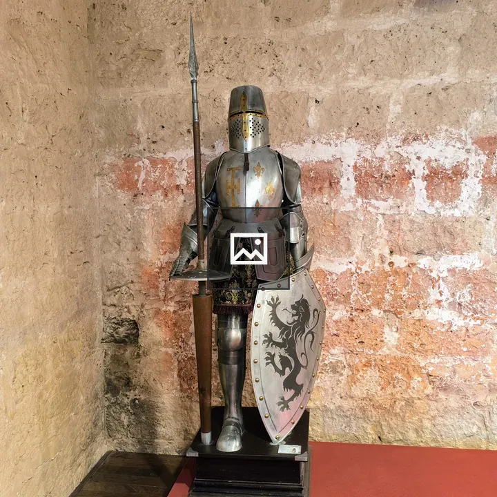 Armor breastplate and helmet on display