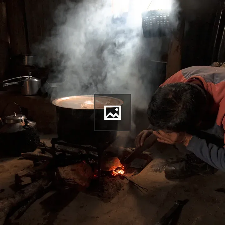 Person by Wood Stove