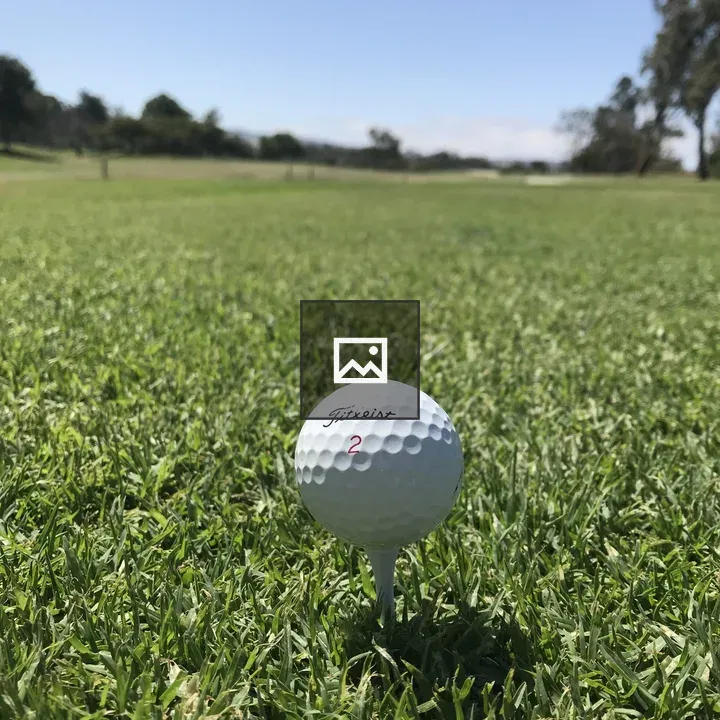 Titleist golf ball on tee