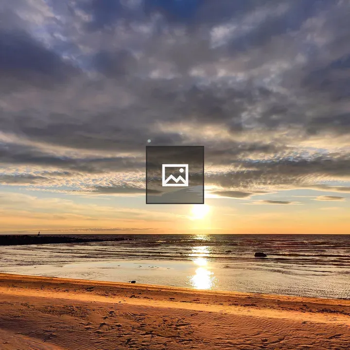 Sunset over tranquil beach