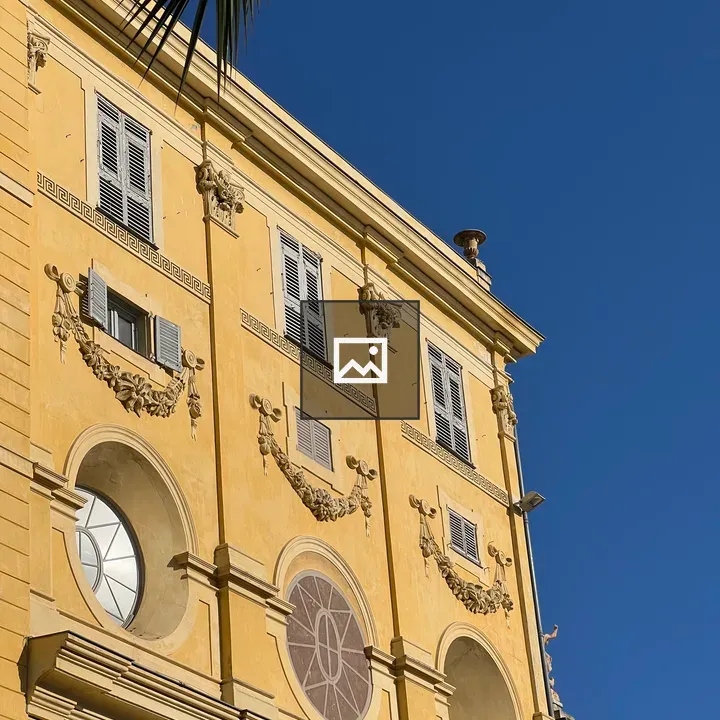 Section of yellow French-style building