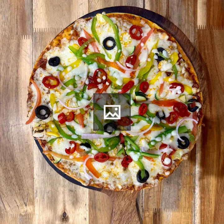 Pizza on Rustic Wood Table