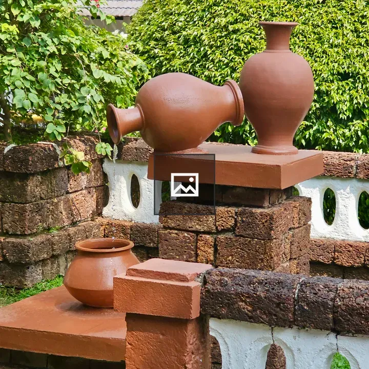 Water fountain with clay plots