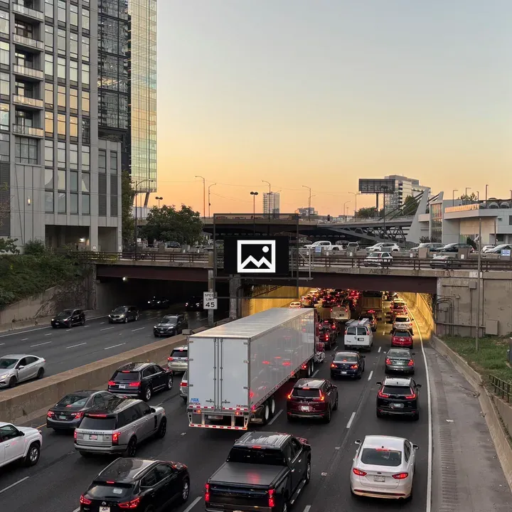 Downtown freeway with tall buildings