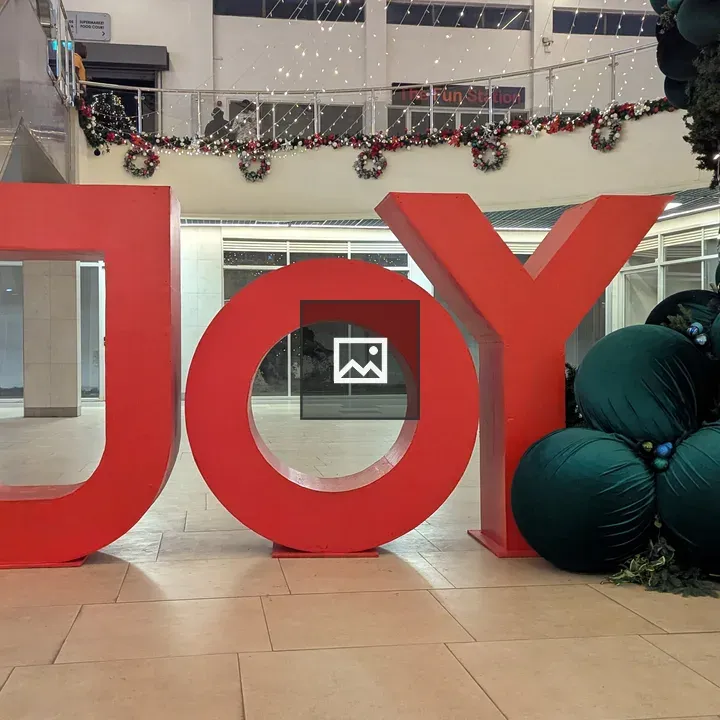 Joy Sign in Festive Interior