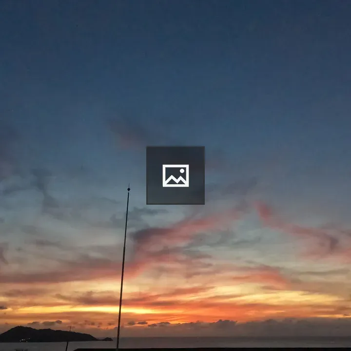 Ocean Sunset with Silhouette and Poles