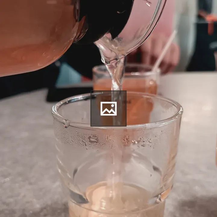 Hot lemon tea pouring