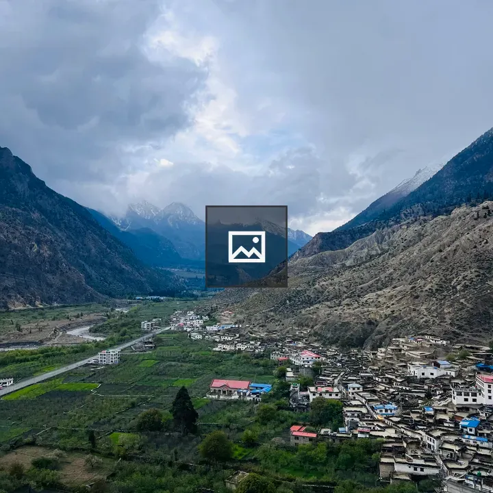 Mountain valley village cliffs