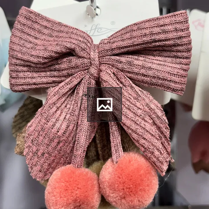 Pink fabric bow hair accessory