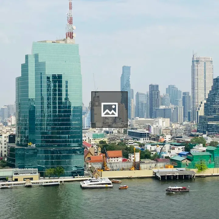 Urban skyline by the river